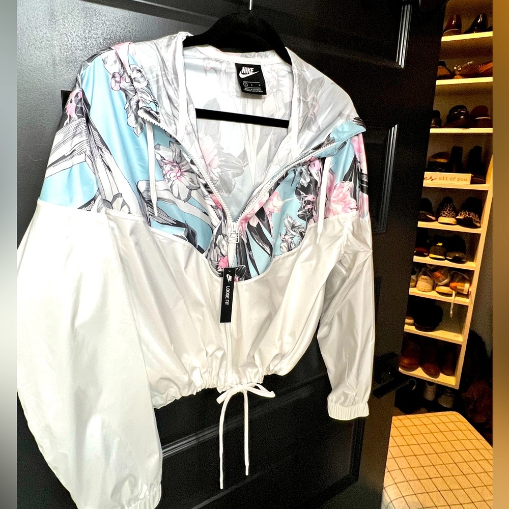 Nike crop style shell jacket.